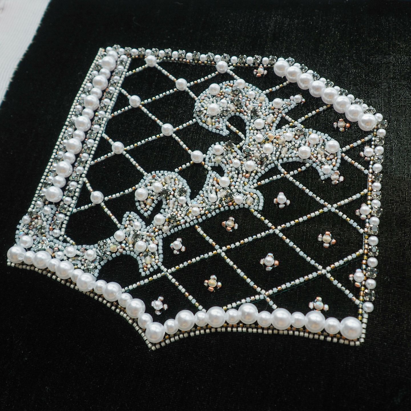 Balmain Fall 2012 Couture Embroidery Study Couture embroidery sample inspired by Balmain Fall 2012, featuring pearl embellishment, small seed beads, metallic accents, and lattice motifs stitched onto deep green velvet.