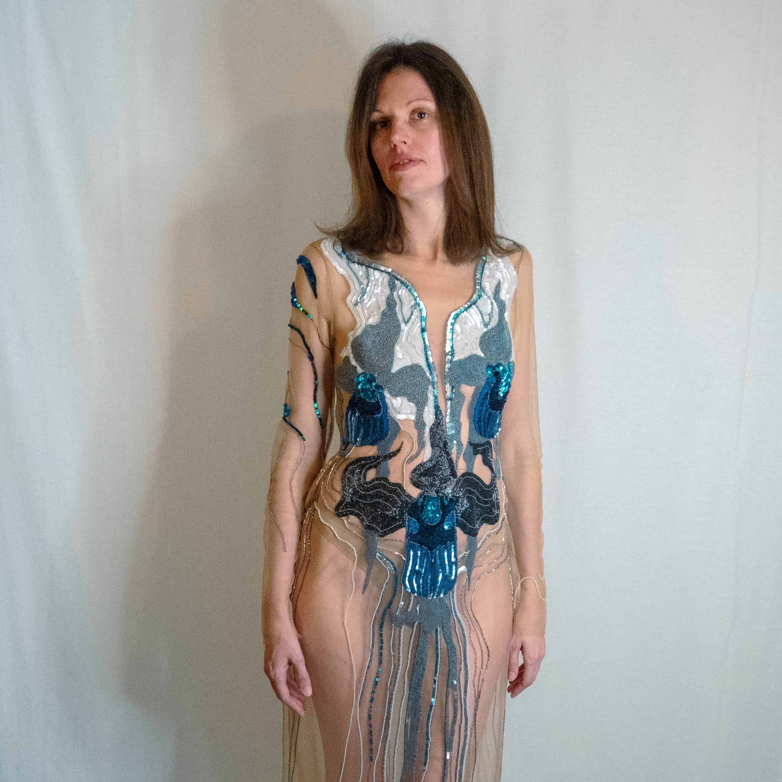 Lady Slipper Couture Dress – Luneville Embroidery Front View Front view of the Lady Slipper couture dress with blue Luneville embroidery, designed and hand embroidered by Ksenia Semirova.
