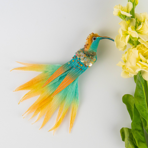 Textile brooch embellished with hand embroidery by Ksenia Semirova