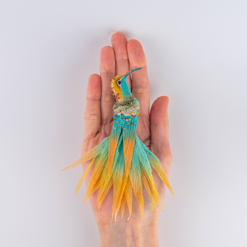 Textile brooch embellished with hand embroidery by Ksenia Semirova