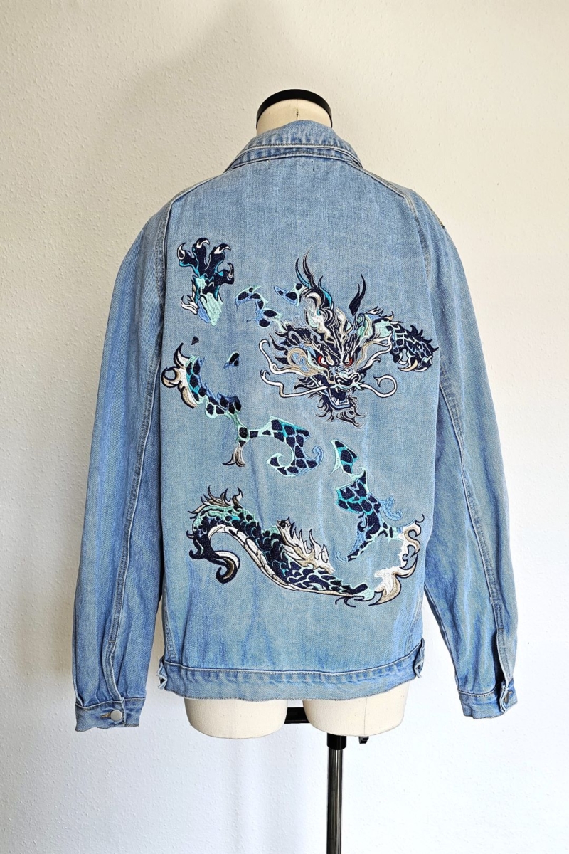 Hand-embroidered dragon denim jacket with velvet, beads, and vintage sequins