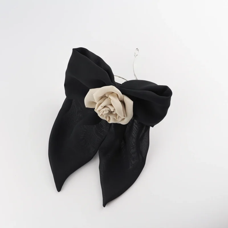 Black chiffon bow hair clip featuring a handcrafted nude chiffon rose centerpiece, perfect for adding a touch of sophistication to any hairstyle