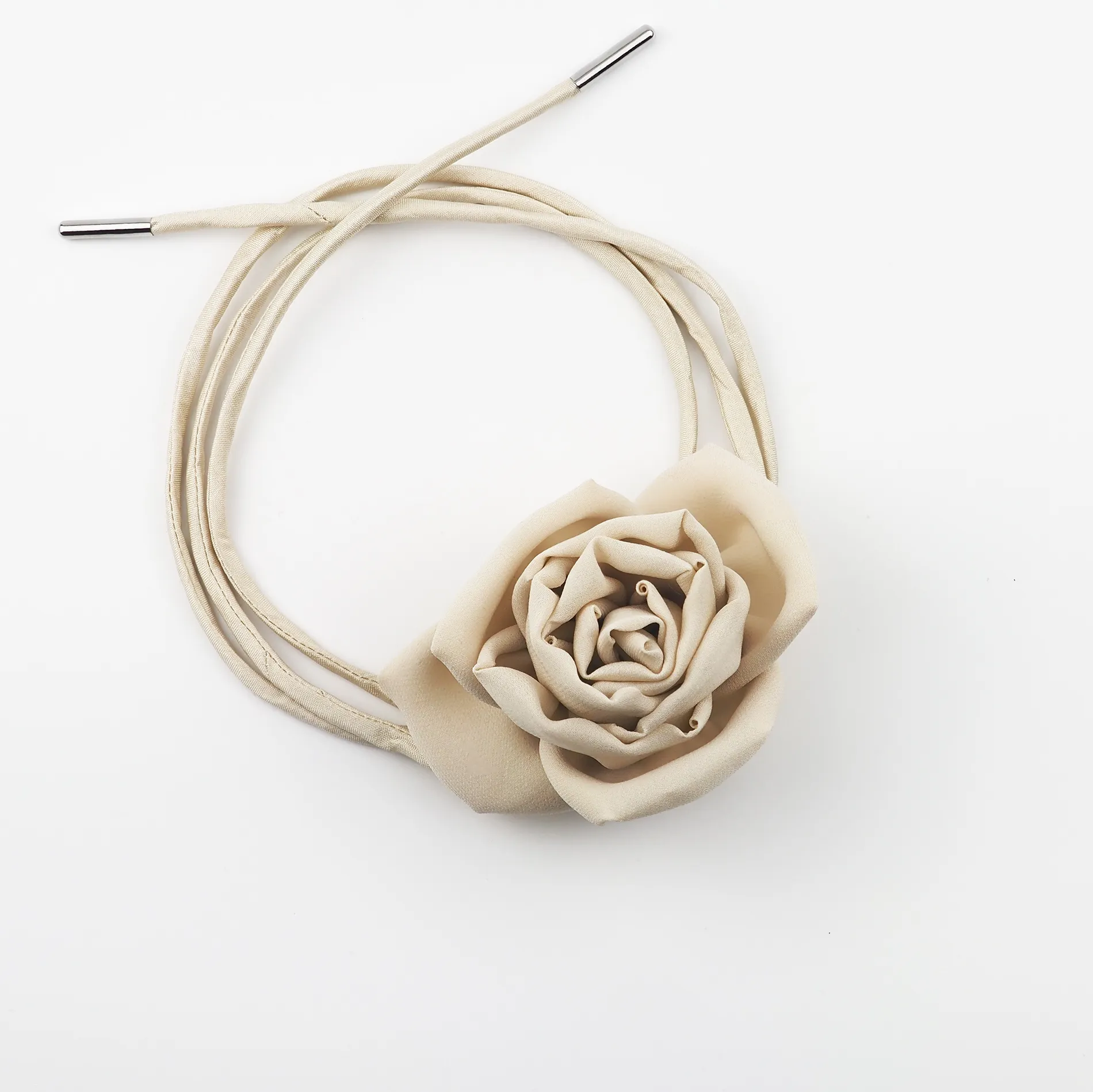 Image of a handcrafted Nude Silk Rose Choker Necklace featuring an 8 cm nude silk rose and adjustable nude dupioni silk lace with nickel-free metal ends. Perfect for weddings, romantic occasions, or coquette-inspired outfits