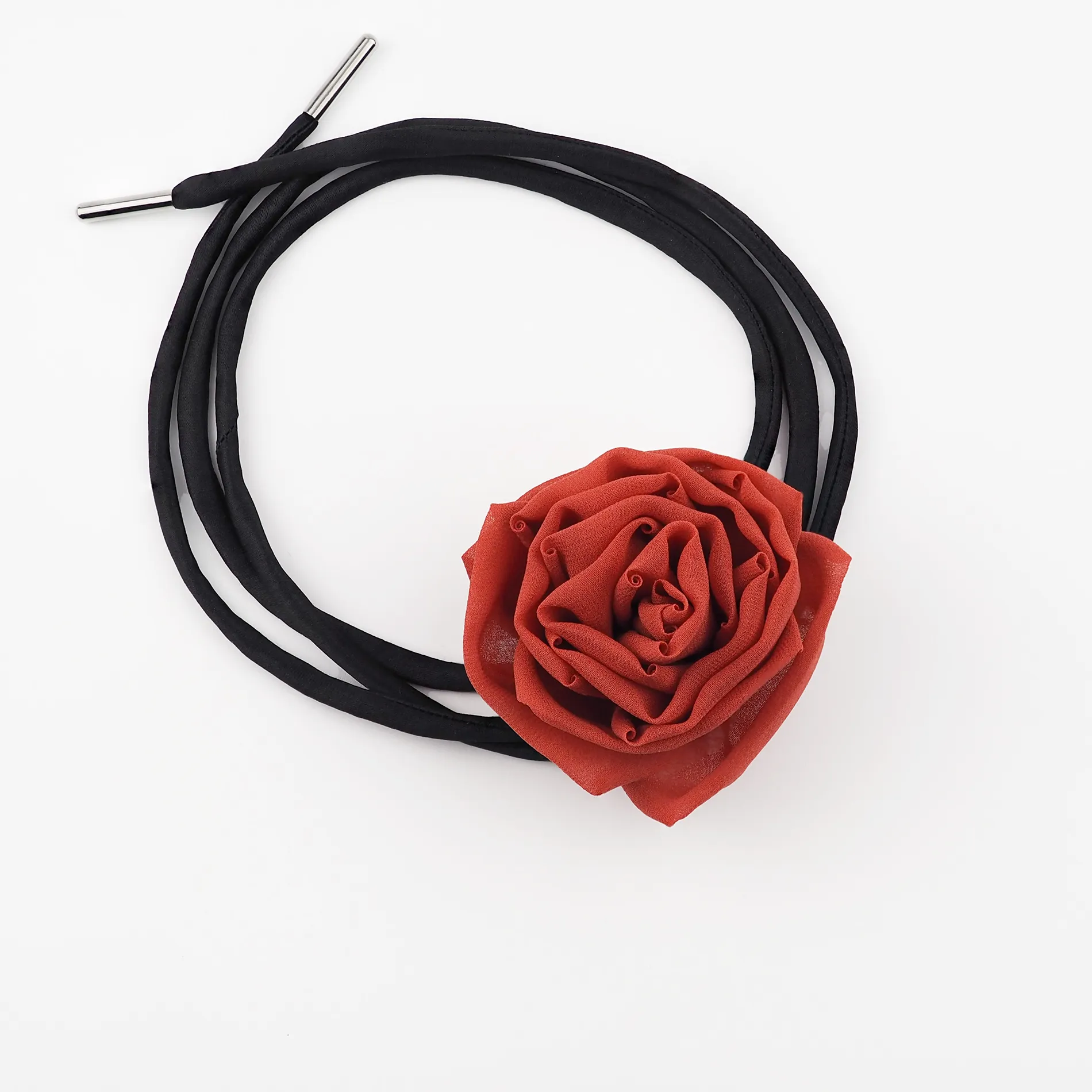 Image of a handcrafted Red Silk Rose Choker Necklace by Ksenia Semirova. Featuring an 8 cm red silk rose centerpiece and adjustable black satin lace with nickel-free metal ends. Perfect for Valentine’s Day, gothic-inspired fashion, or bold statement looks.