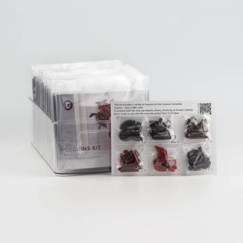 Couture Camellias Sequins Kit featuring six individually packaged types of 4mm sequins, pre-strung on thread for couture and Luneville embroidery projects.