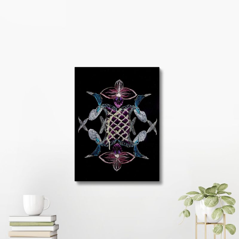 Framed embroidered orchid composition on velvet by Ksenia Semirova shown on a wall above a modern bookshelf with plants and decor in a neutral-toned room.