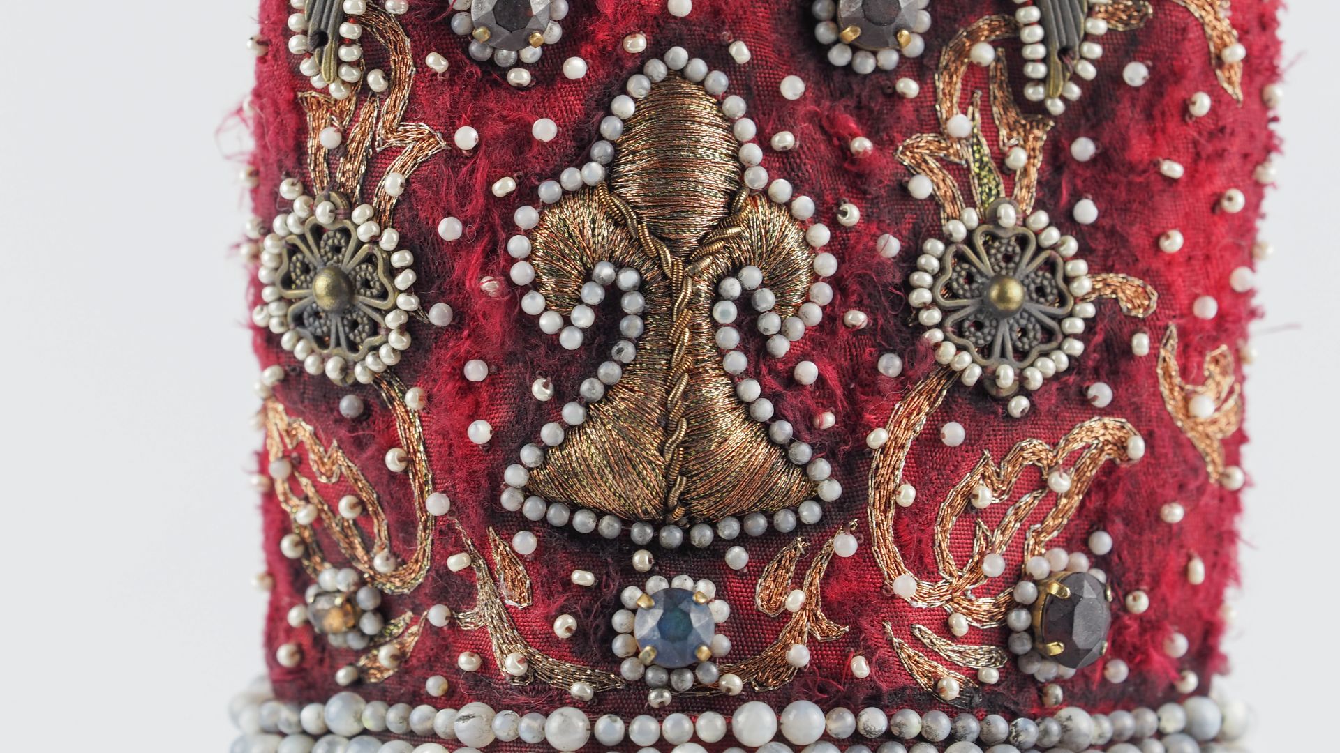 Cosplay Embroidery Commission Goldwork and Pearl Detail on Red Fabric | Ksenia Semirova. Embroidery art Goldwork embroidery with pearls and decorative metalwork on rich red fabric, created for a custom cosplay embroidery commission with competition-level detail