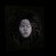 Sorrow from the Power of No series, a hand-embroidered textile portrait by Ksenia Semirova.