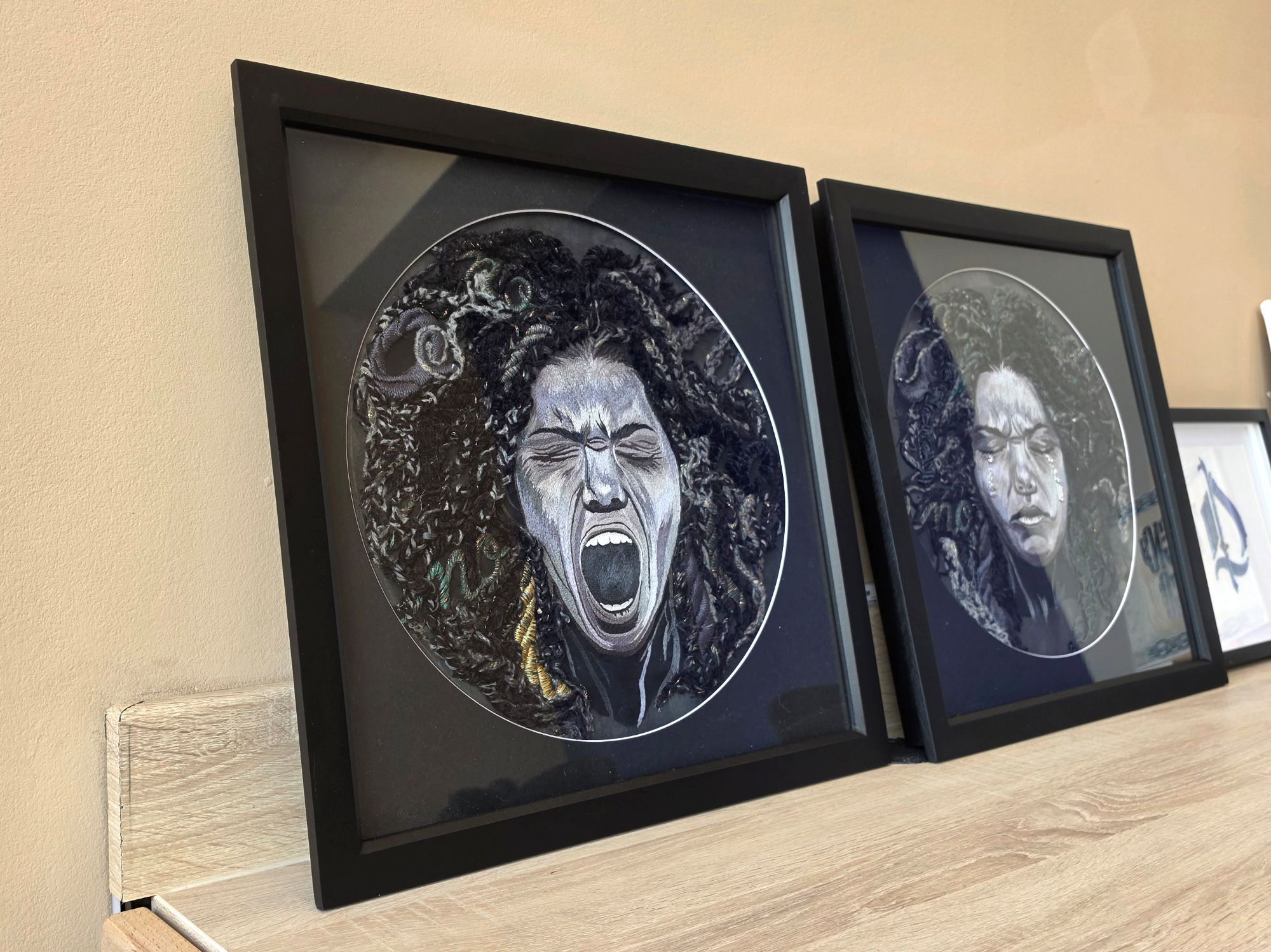 Power of No Despair and Sorrow Framed Textile Wall Art Framed hand embroidered textile artworks Despair and Sorrow from Ksenia Semirova’s Power of No wall art series, displayed together in black frames.