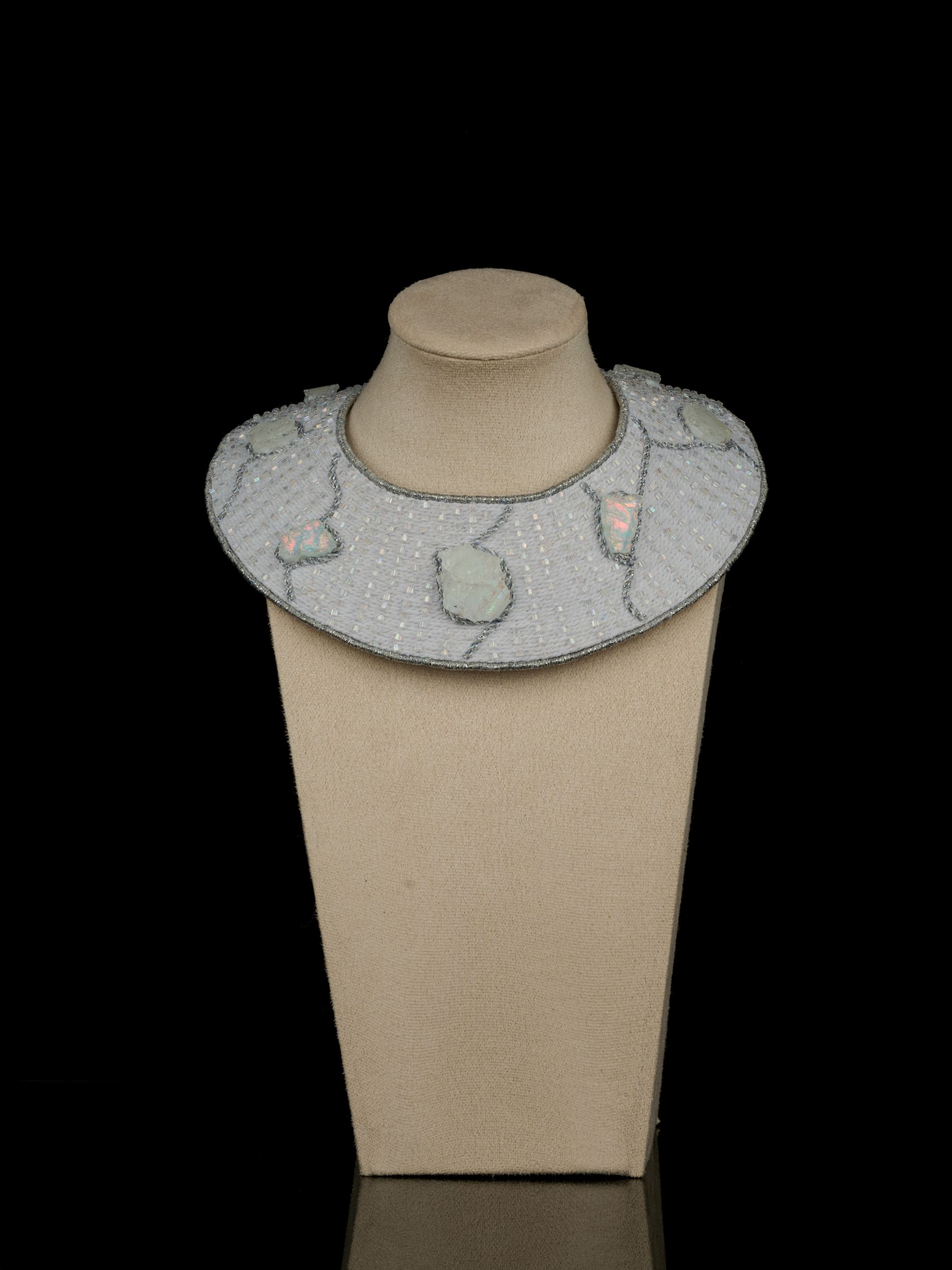 White embroidered collar necklace with iridescent glass elements from the To the Moon and Back collaboration